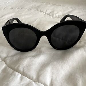 Authentic Maverick and Wolf Gucci sunglasses.